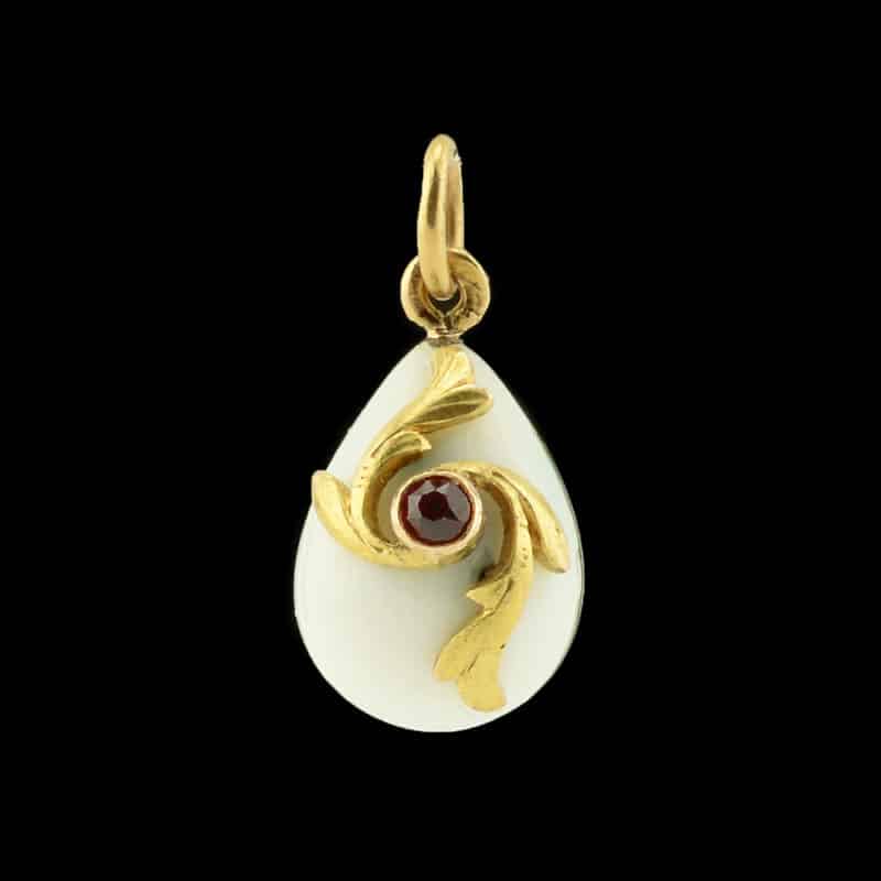 A Russian jeweled gold, silver, and guilloché enamel miniature pendant Easter egg